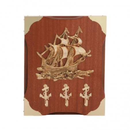 Key hanger with sailship on wall board