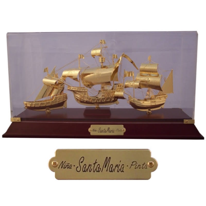 Sailships of gilded brass in showcase 38x21x13cm