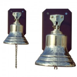Polished brass bell of 12cm on wooden board 20x16x11cm