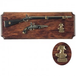 Miniatures of Napoleon rifle and pistol on wall wooden board